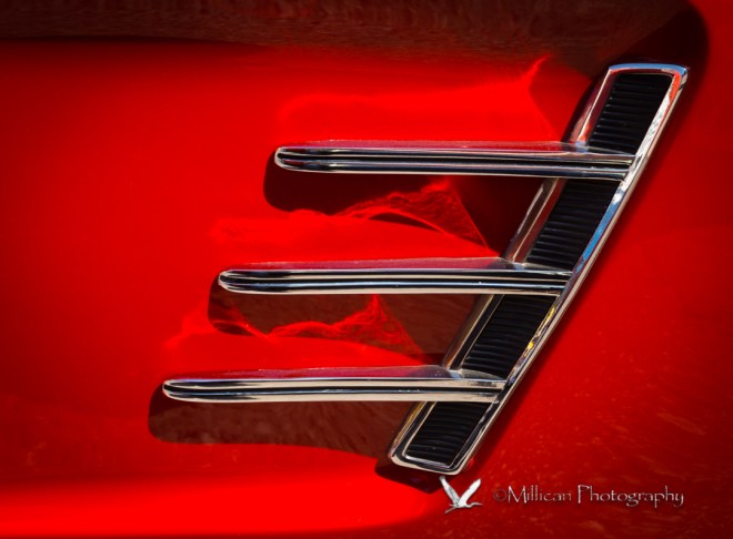 Side panel of a red 1966 Ford Mustang.  Yes, I had one like it...